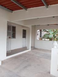 Backyard garden area fenced wall affordable house sale Nuevo Emperador