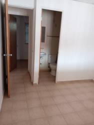 Covered porch with iron security bars, front entry of 3BR house Arraiján Panama