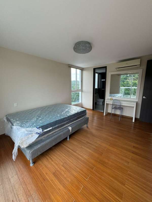Master bedroom with attached bathroom, AC, desk and window to greenery, Clayton Park II Panama