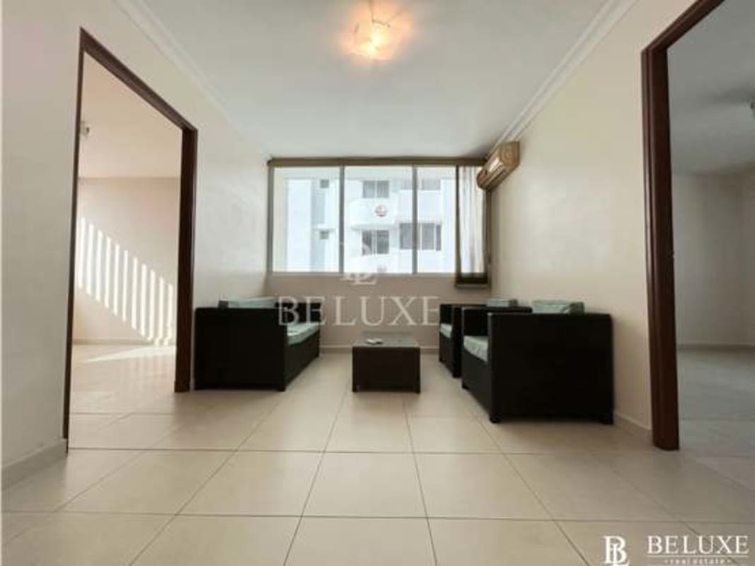 Spacious kitchen with granite countertops and window in PH Solaris El Cangrejo Panama City