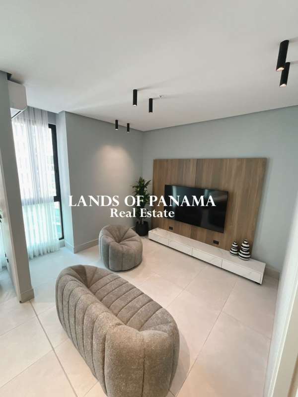 Double-height lobby with designer finishes at PH AquaPoint Punta Paitilla Panama City