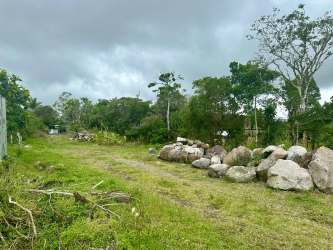 Large rural lot with stream, trees and rocks in Nueva California Volcán
