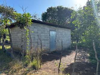 Simple utility shed made of concrete blocks on rural farm Salitrosa Panama