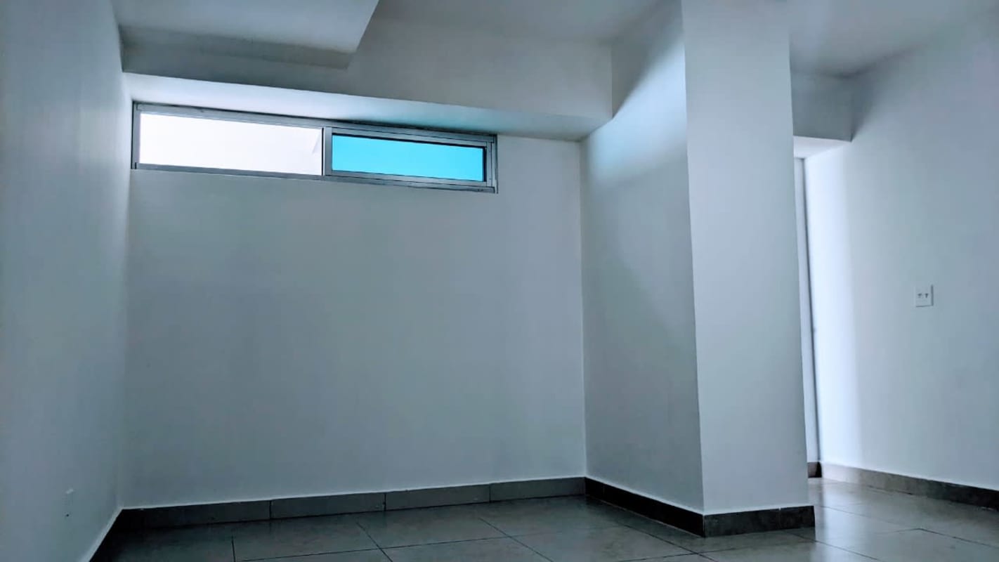 Modern bathroom with walk-in shower and vanity in PH Keops San Francisco Panama