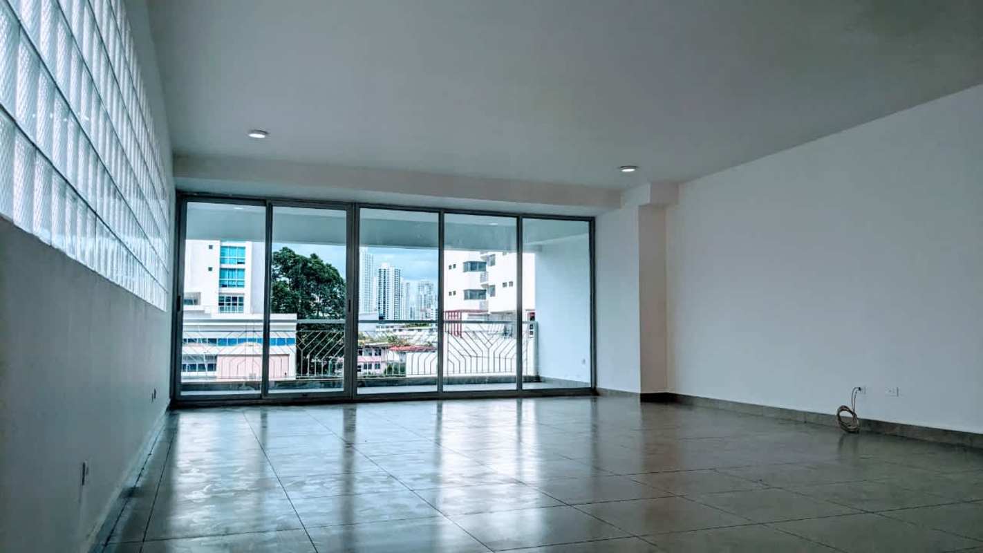Modern kitchen with granite countertops and dark cabinetry in PH Keops Tower Panama City