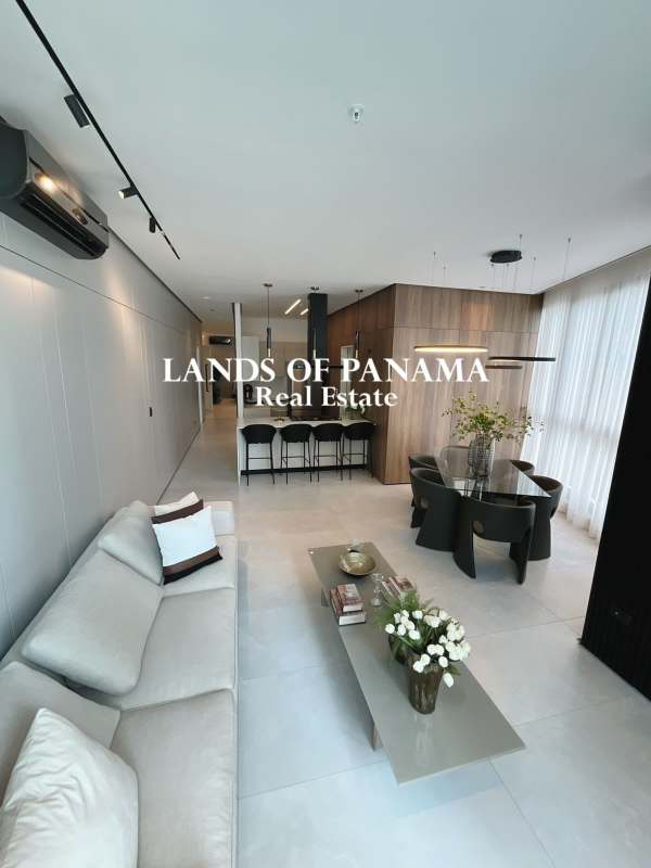 Large primary bedroom with ensuite, walk-in closet, floor-to-ceiling window at AquaPoint Panama City