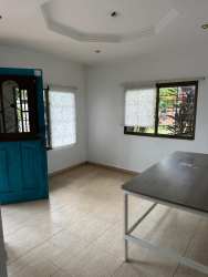 Office or treatment room tiled floors window security bars David Panama