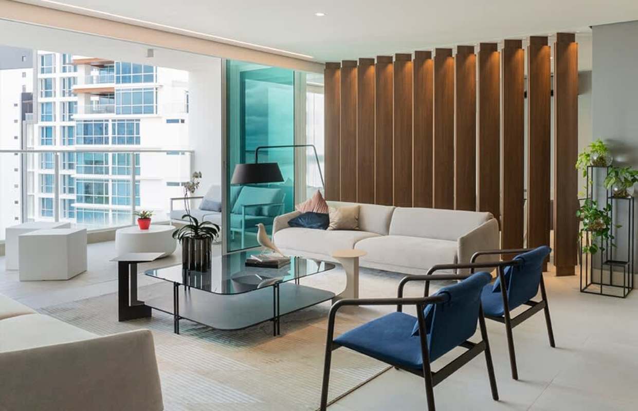 Sleek kitchen with quartz, island and stainless appliances at Riviera del Golf Coco del Mar