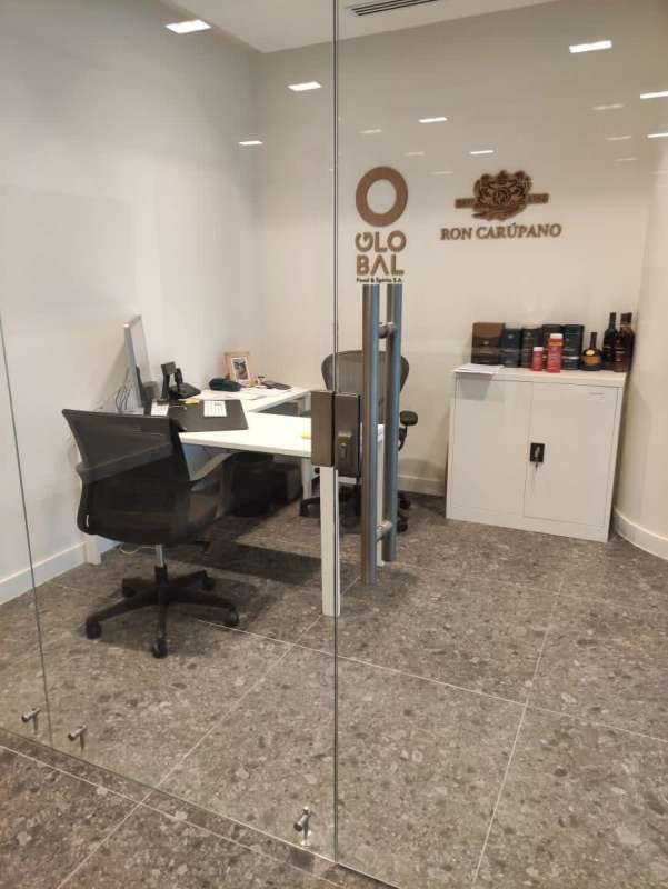 Modern minimalist gray tiled bathroom in commercial office Time Square Center Panama