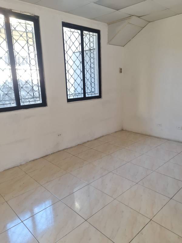 Full bathroom with glass sink, wall mirror, ceramic toilet and tiled walls in El Carmen commercial property for rent