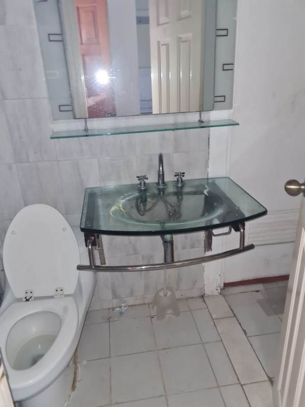 Empty interior with wooden laminate flooring, air conditioner, large windows in El Carmen commercial property rent