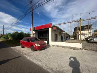 Parking lot and security fence of commercial building in downtown David Panama