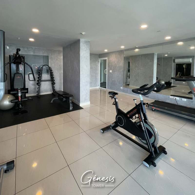 Fully equipped gym with weight and cardio machines at PH Genesis Tower Panama