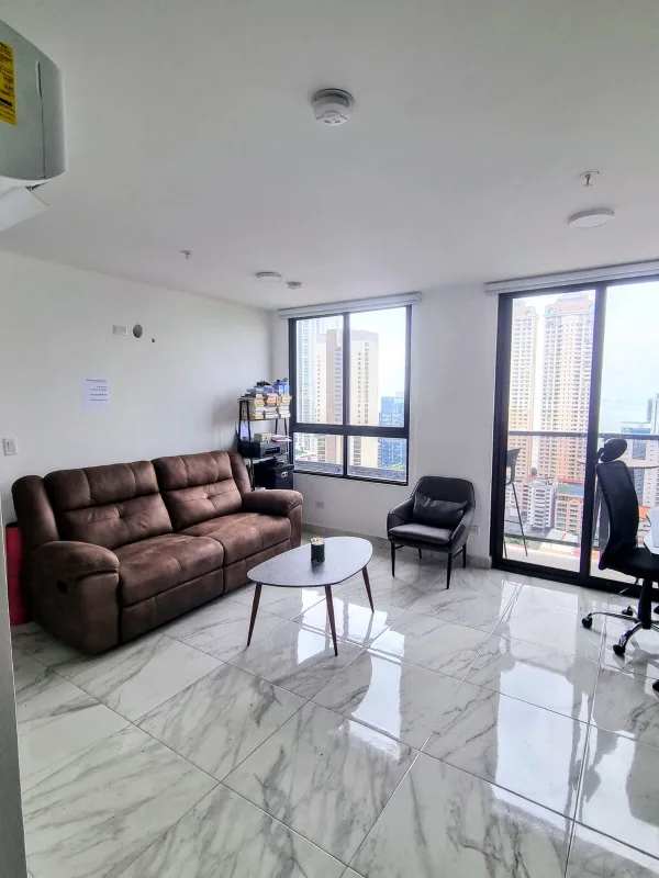 Rooftop infinity pool with ocean and city skyline backdrop at PH BICSA Panama City