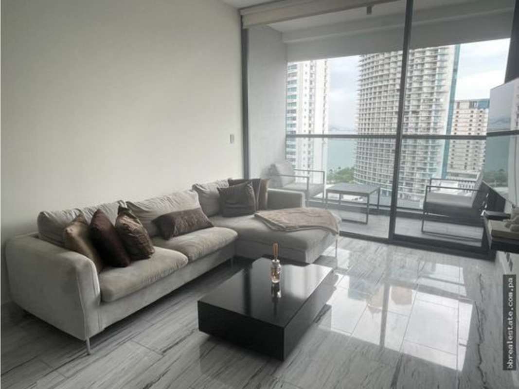 Modern open-plan kitchen with island and dining area marble floor Nuovo by Armani Panama