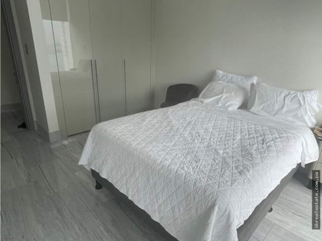 Contemporary bathroom with marble, glass shower, designer fixtures at Nuovo by Armani Panama