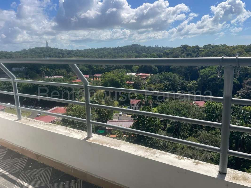 Spacious balcony with panoramic lush garden views at Clayton Park Residences Panama