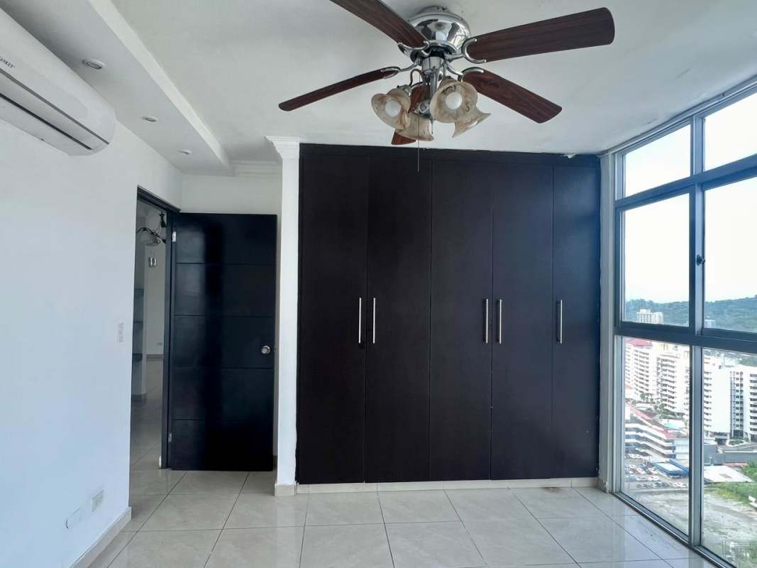Master bedroom with built-in closet and tiled floors PH Crystal Hills Panama