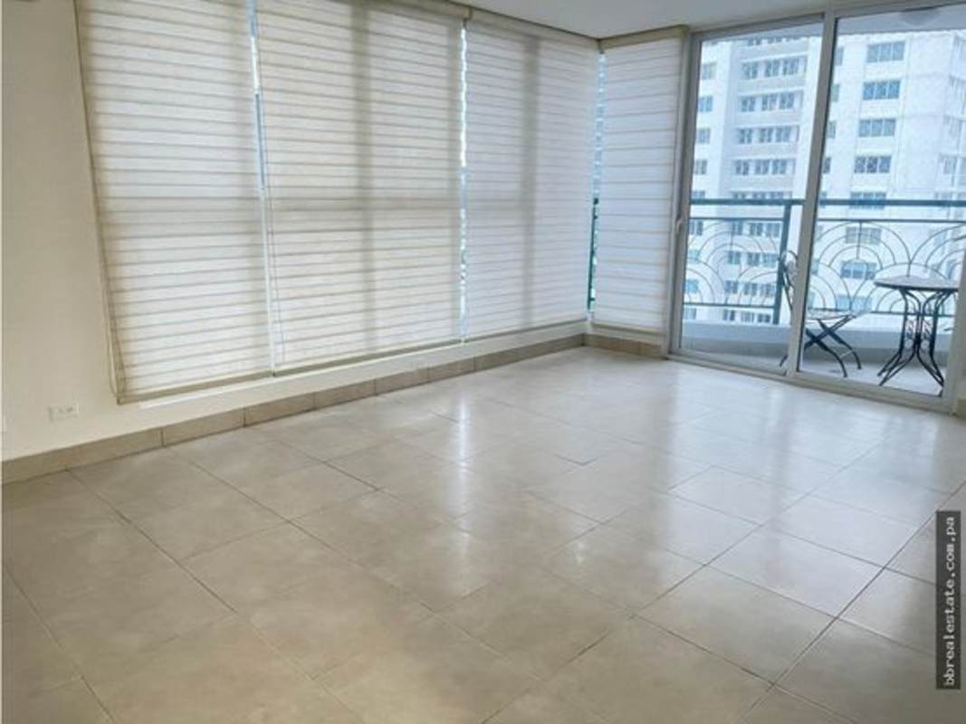 Remodeled kitchen with granite countertops, stove, refrigerator, laundry center in PH Belview Tower Edison Park Panama