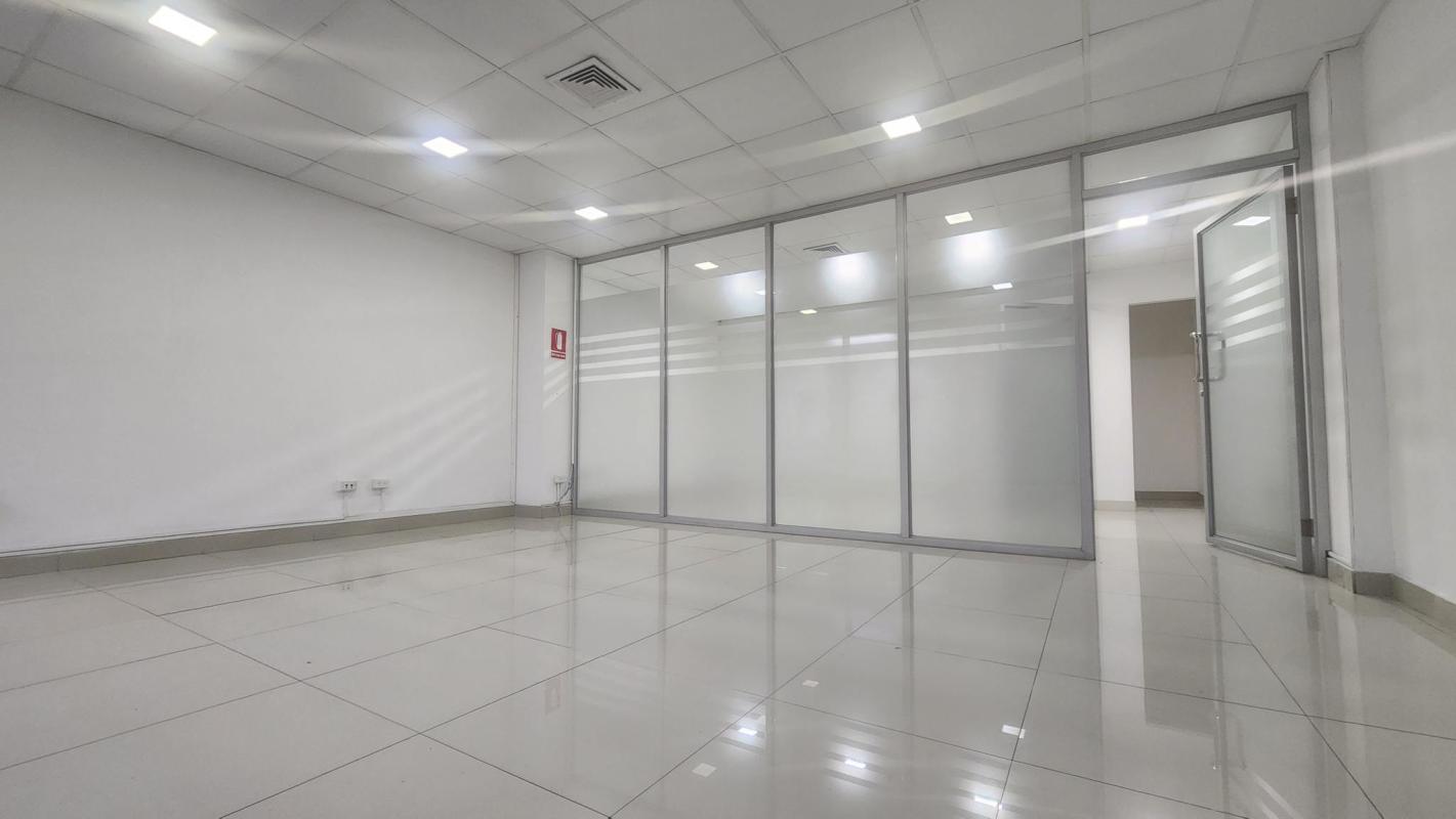 Frosted glass swift panels dividing office space tiled flooring PH Plaza Obarrio Panama City