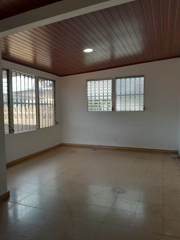 Spacious living room rental house with secure windows, wood ceiling Panama