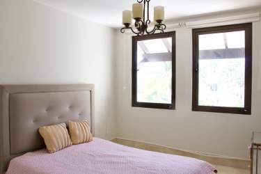 Hallway view leading to bedrooms in Buenaventura beachfront condo Panama