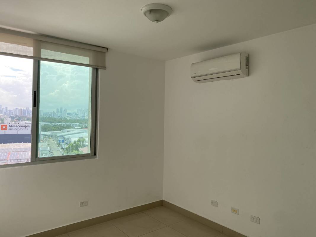 Bedroom with wide window, panoramic ocean and skyline view in PH Sevilla Costa del Este Panama