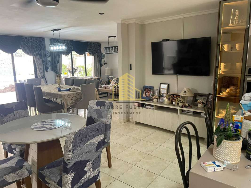 Open plan living dining area with modern furniture and natural light in Brisas del Golf Panama