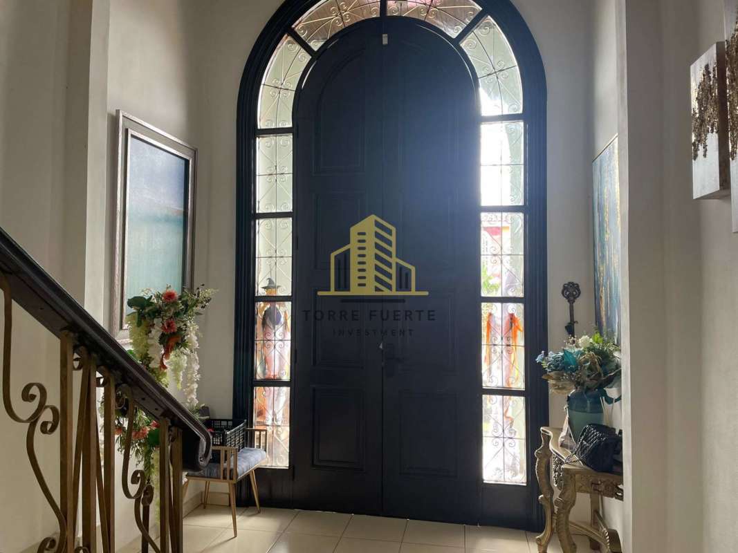 Bathroom with granite countertop, vessel sink and decorative tiles in Brisas del Golf house Panama