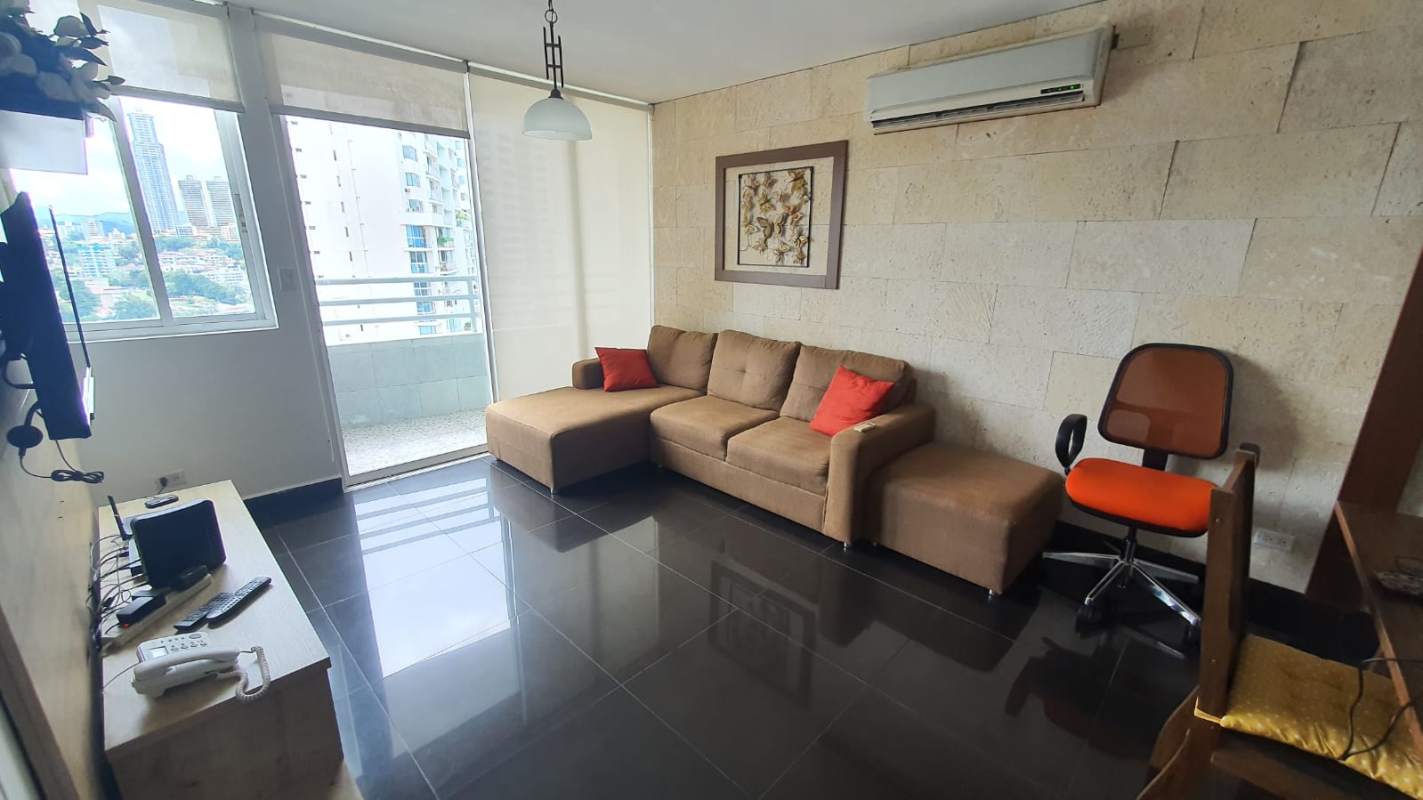 Modern living room with sofa and large windows to balcony, city view PH Majestic Garden Panama