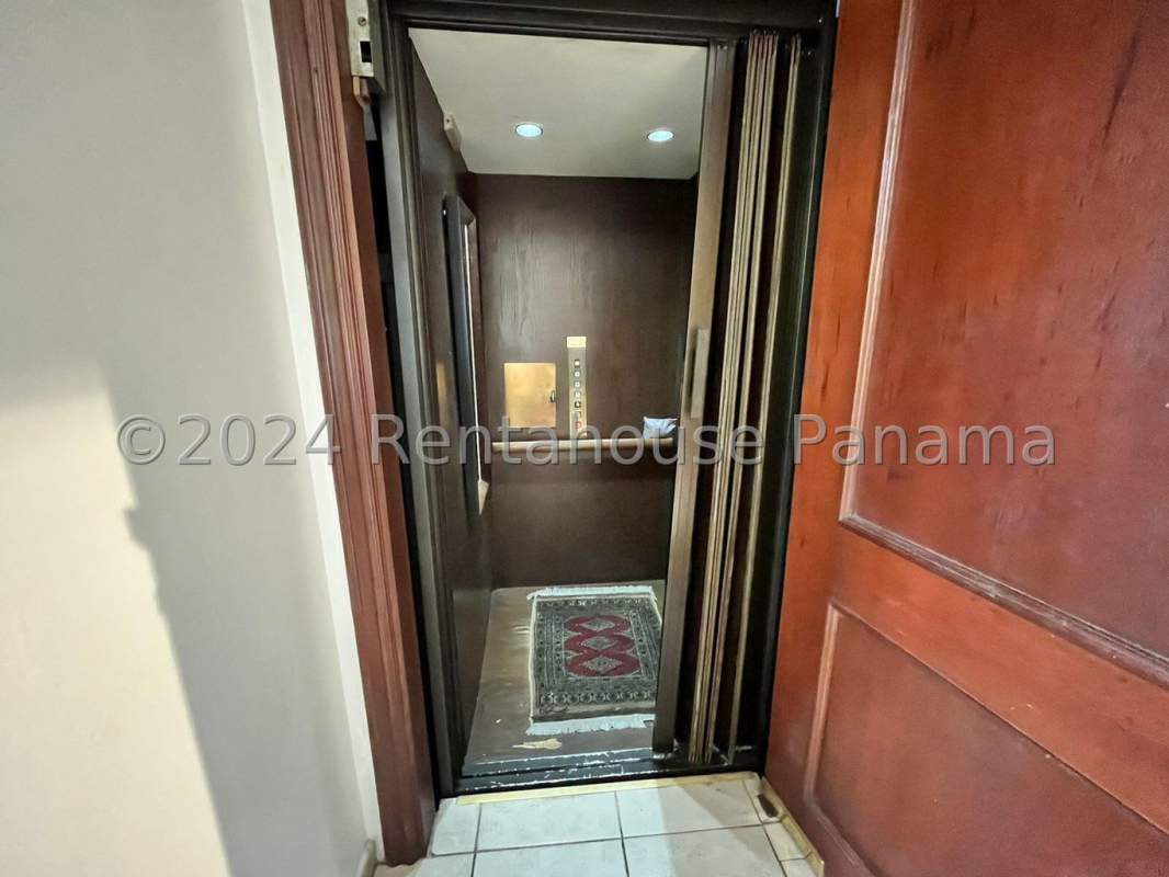 Master suite with walk-in closet, balcony access in luxury villa Coco del Mar Panama City