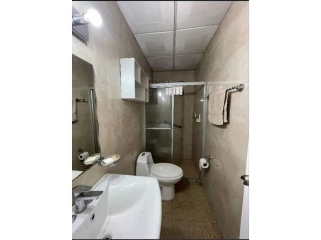 Remodeled bathroom with sink cabinet, glass shower, beige tile in Cerro Viento Panama