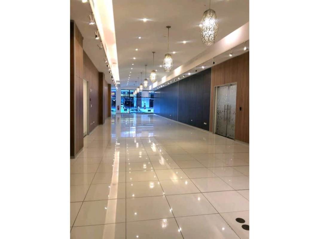 Commercial lobby with glossy tile floors, pendant light fixtures in PH Obarrio Plaza Panama City