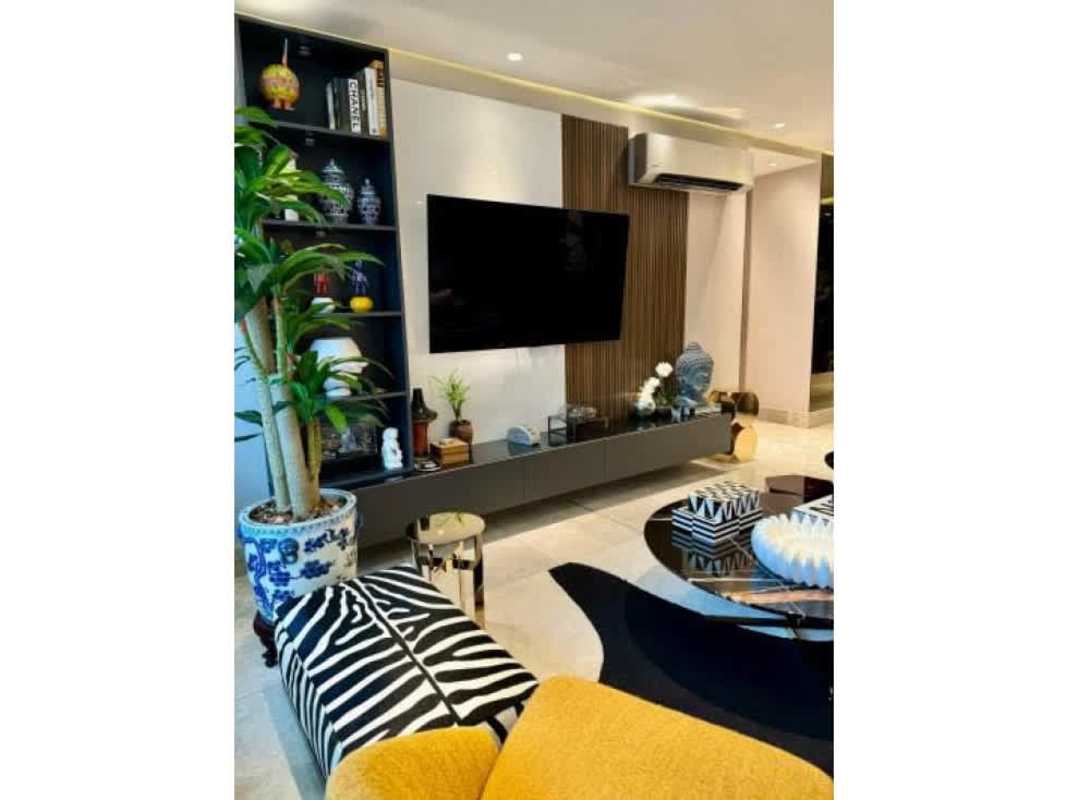 Master bedroom with large window and ocean views in PH Costanera Panama City