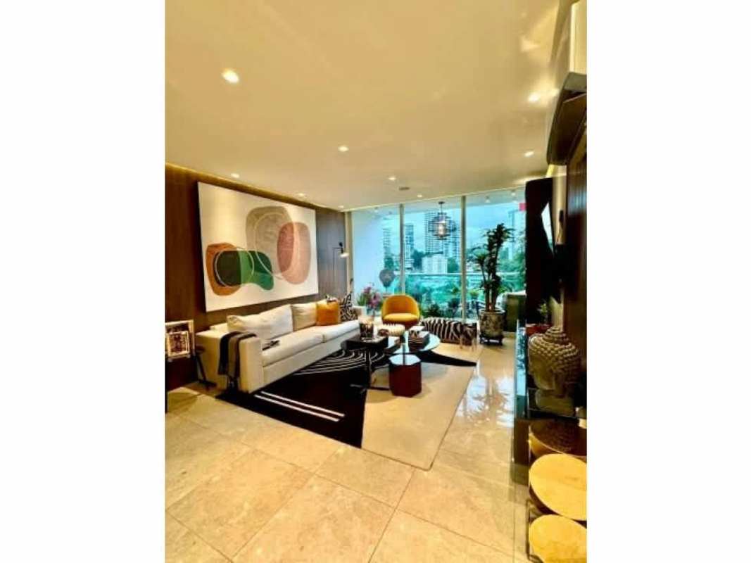 Modern open living dining area in PH Costanera with city skyline views Panama