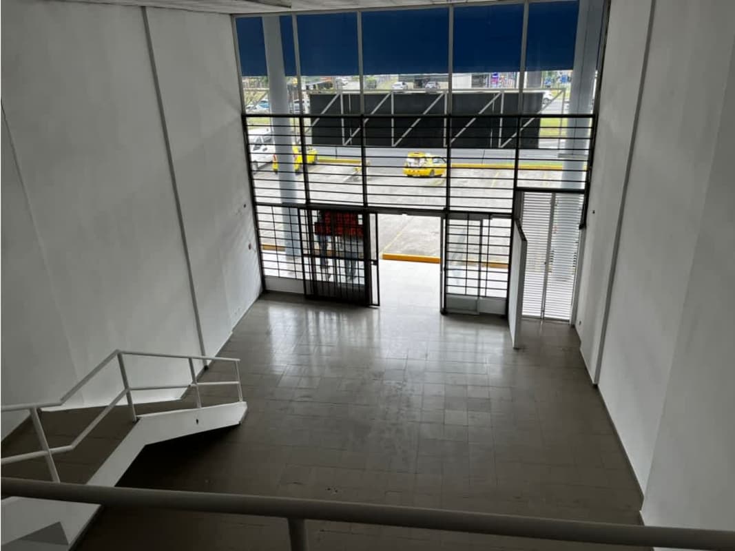Large glass entrance and window commercial space with security grills plaza Juan Díaz Panama