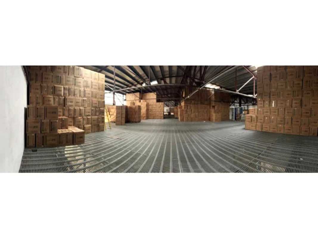 Covered loading dock with container truck at industrial property Panama City