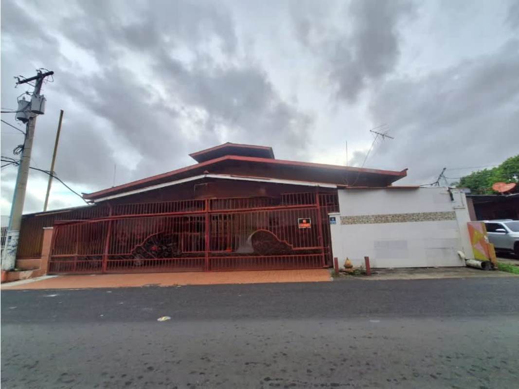 Exterior gated urban house with tiled driveway parking Rio Abajo Panama