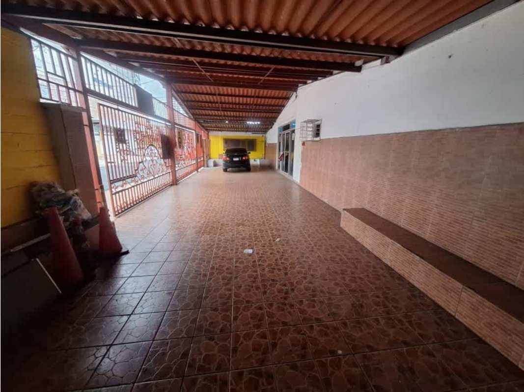 Covered carport tiled floor secure metal gate Panama warehouse for rent