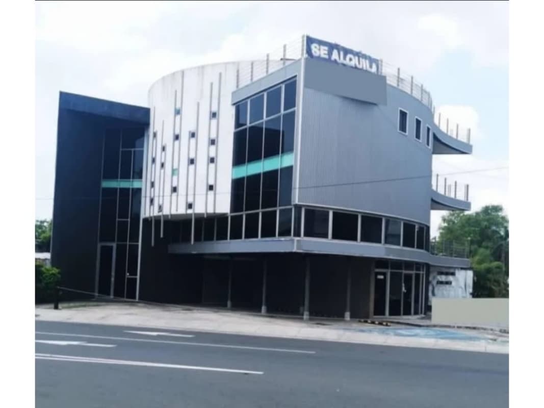 Contemporary curved retail/office facade with rooftop terrace signage opportunity in Costa del Este, Panama