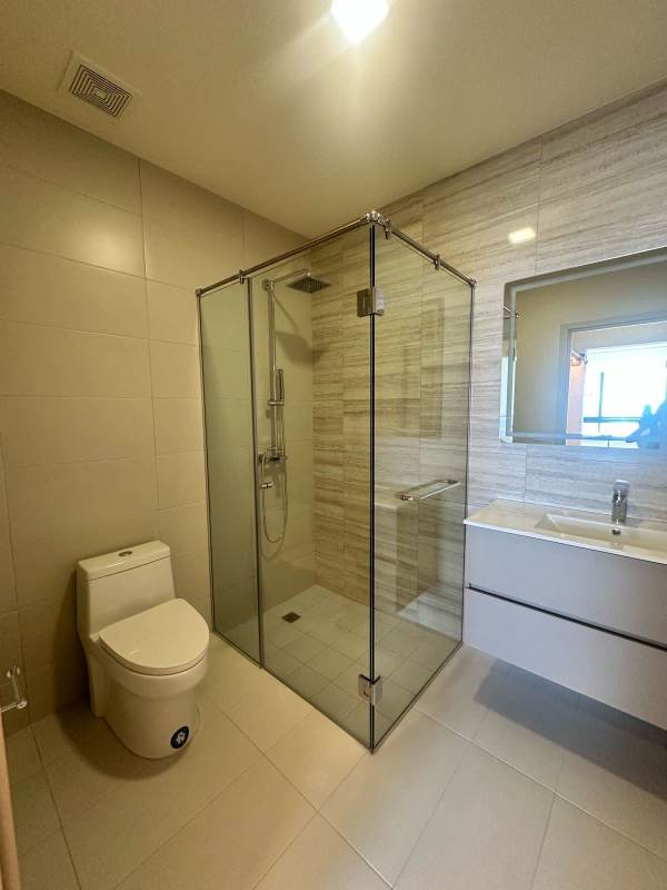 Modern bathroom with glass shower wall mount vanity PH Costa del Este Tower Panama