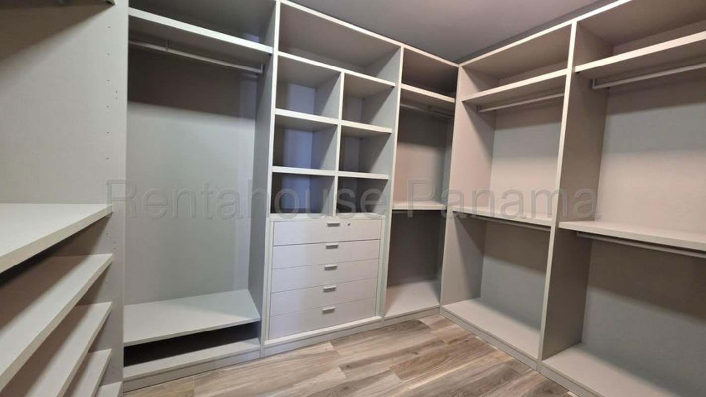 Elegant master bedroom with large windows and stylish finishes at Santa Maria Golf & Country Club Panama