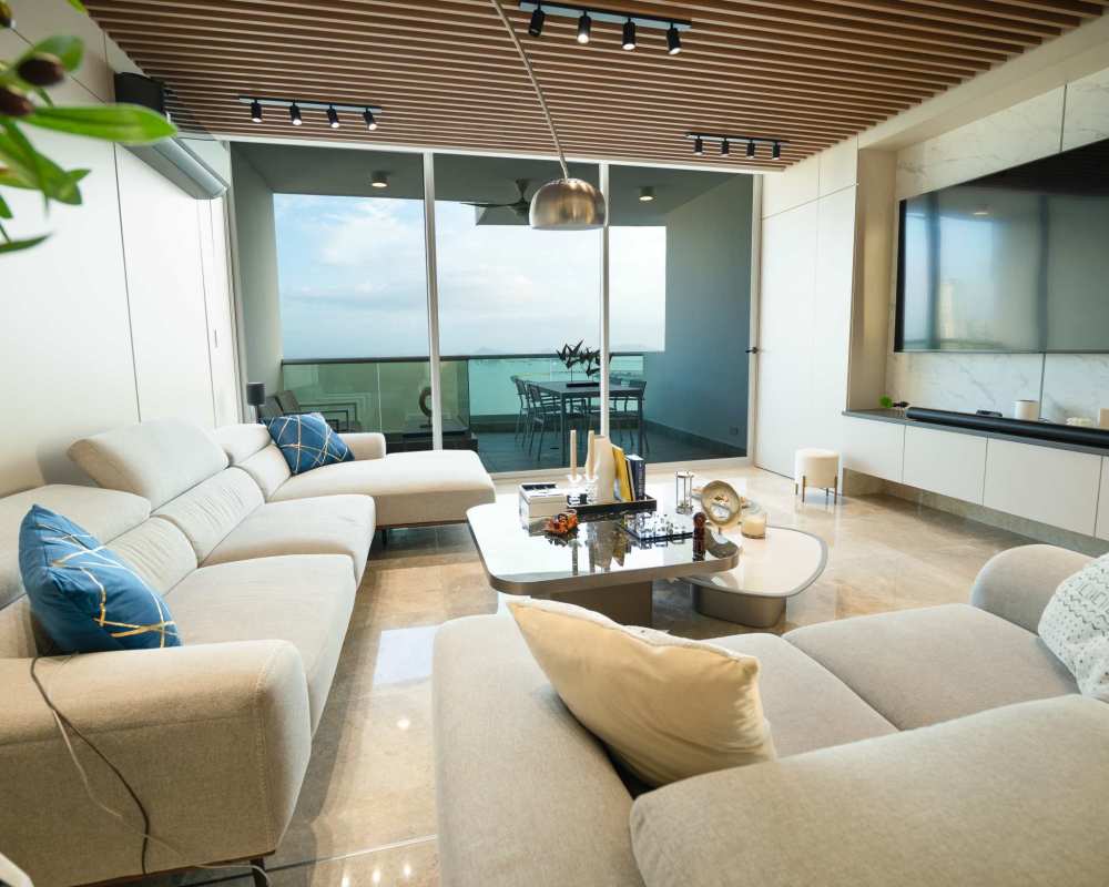 Modern kitchen with stainless steel appliances and panoramic window PH Costanera Panama