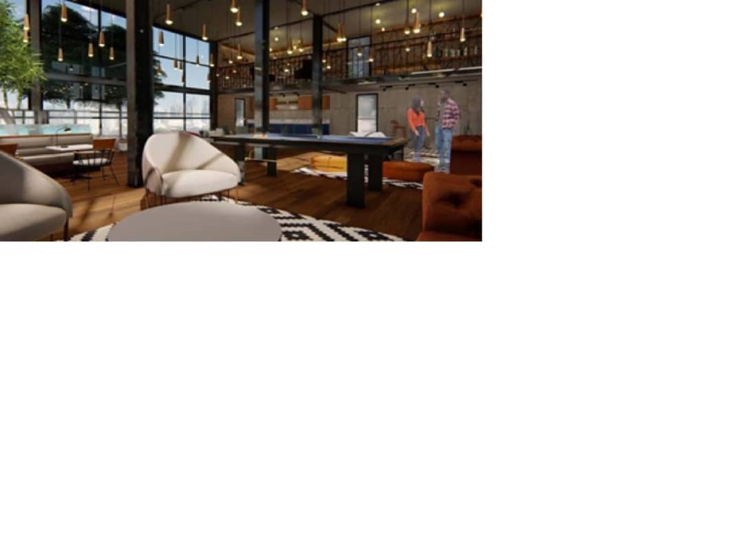 Modern indoor lounge and co-working space with floor-to-ceiling windows at Loft6750 Panama