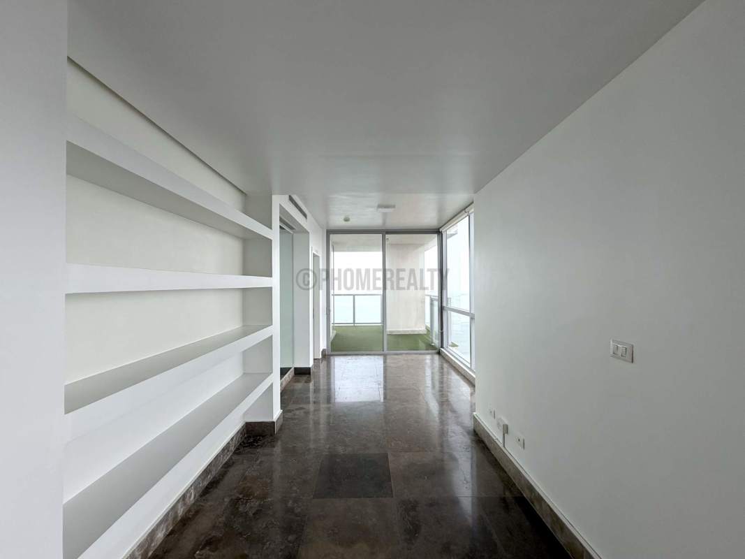 Elegant master bedroom floor-to-ceiling glass overlooking Pacific Ocean at PH Yoo Panama