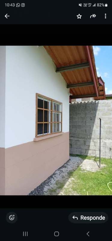 Kitchen area with tile counters windows in rental house La Cabima Panama