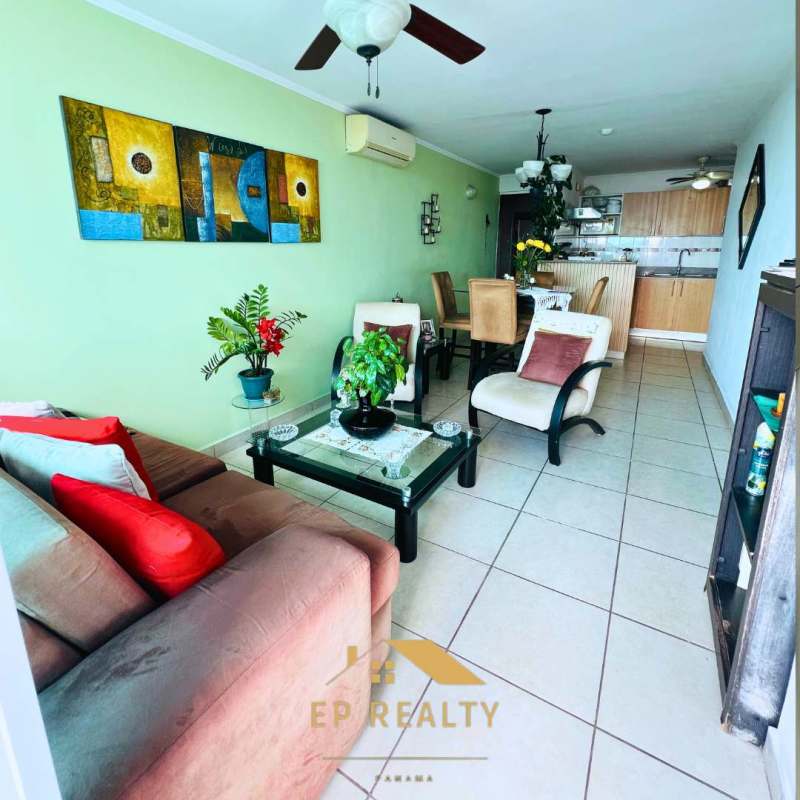 Contemporary open-plan living dining room with ceramic floors and balcony city view Parque Lefevre Panama