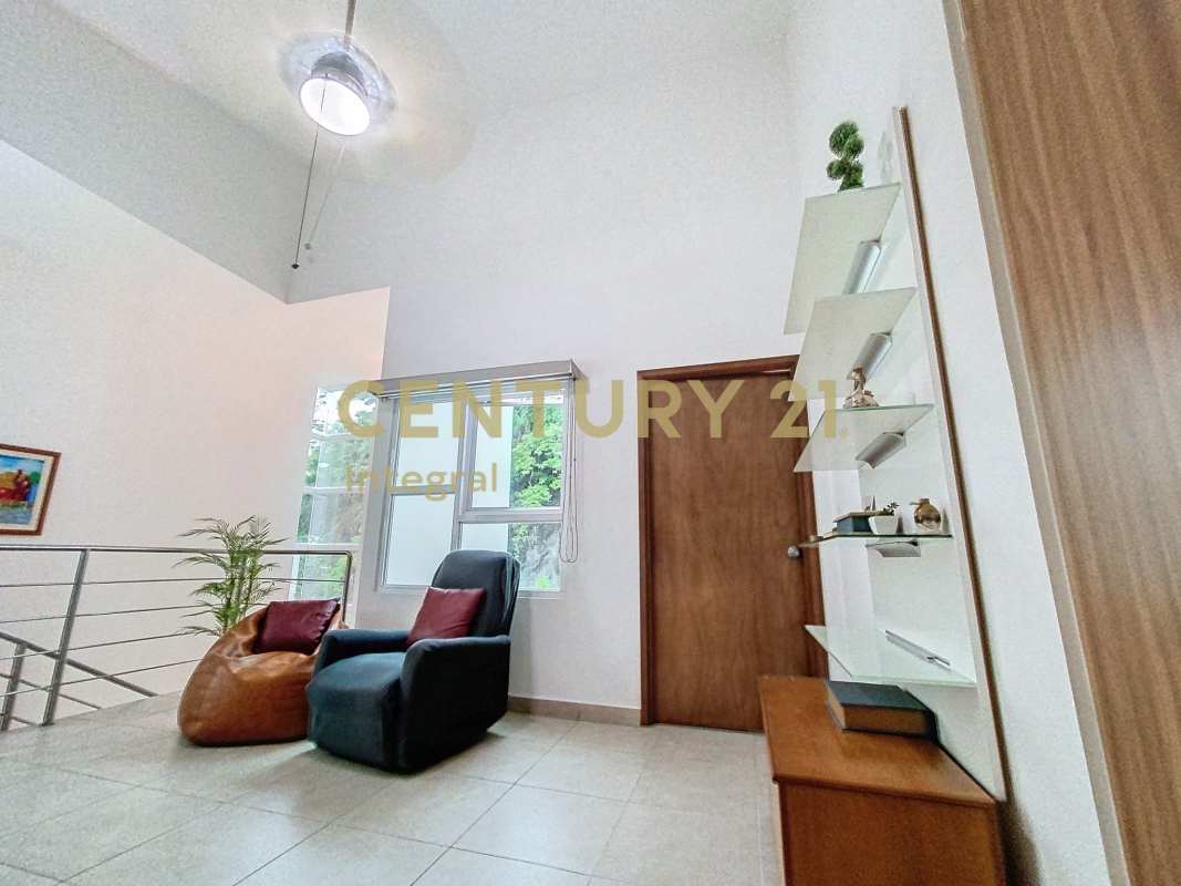 Dining room with large glass doors overlooking garden in PH Horizontes Altos de Panamá