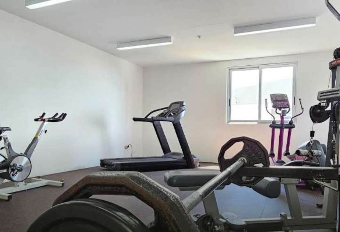 Apartment tower gym with cardio machines and weight lifting equipment in Calidonia Panama