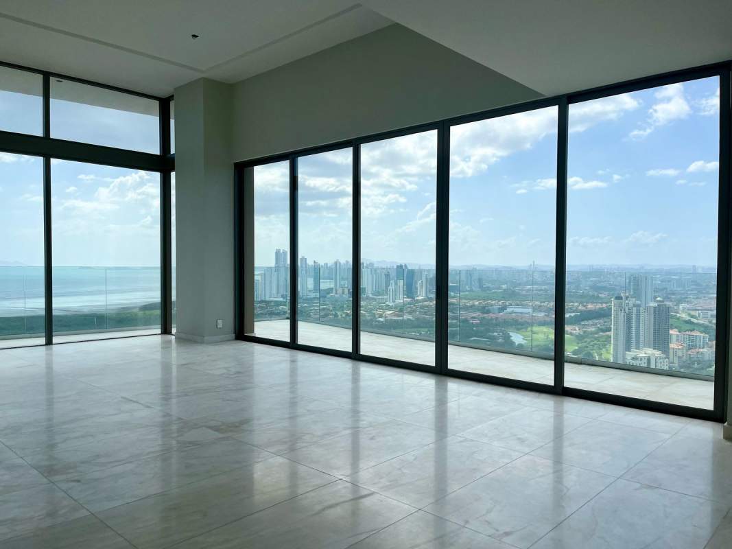 Modern bathroom with marble walls, freestanding tub and shower in La Maison by Fendi Casa